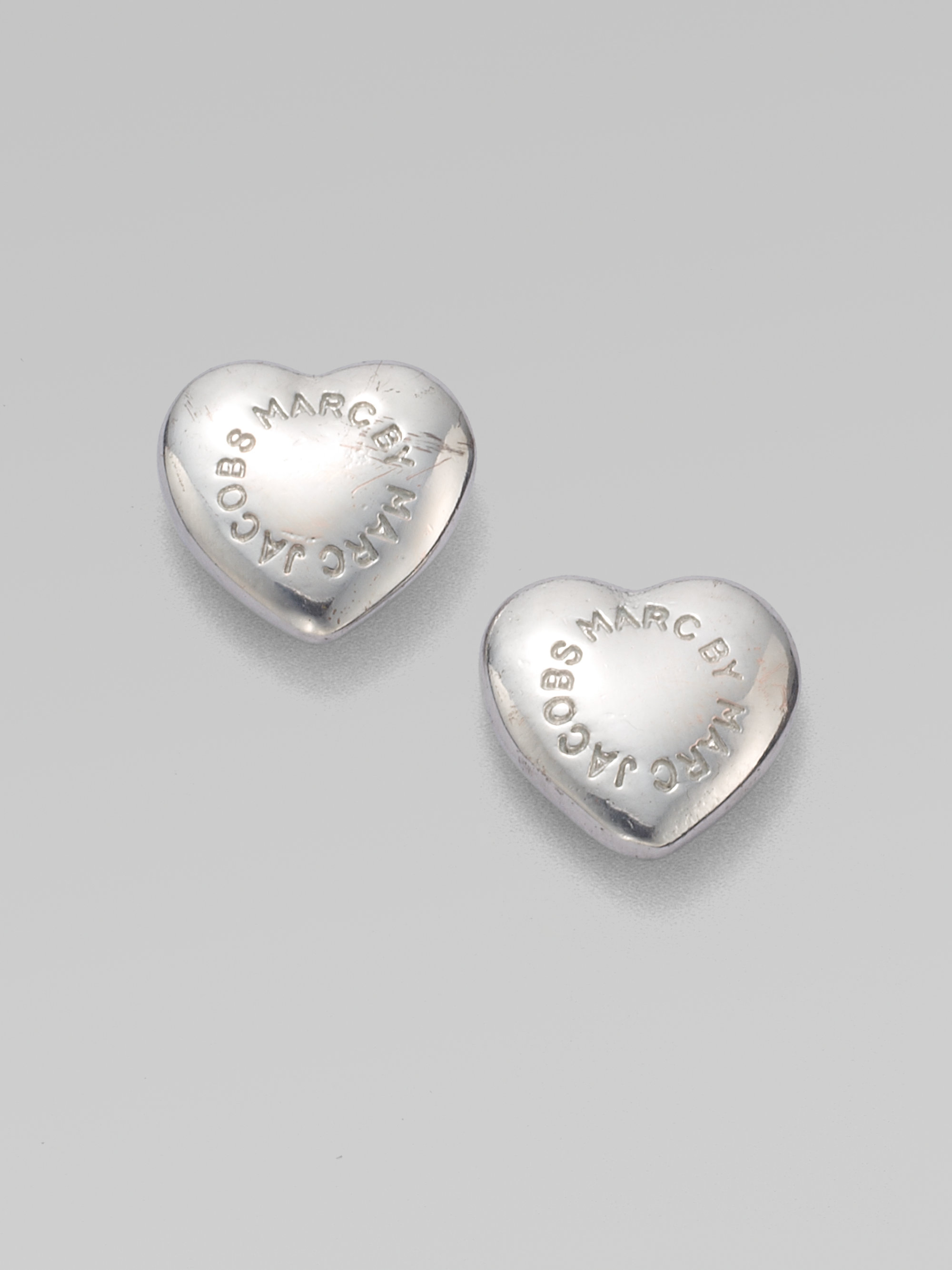 Lyst Marc By Jacobs Heart Logo Stud Earrings In Metallic Gallery
