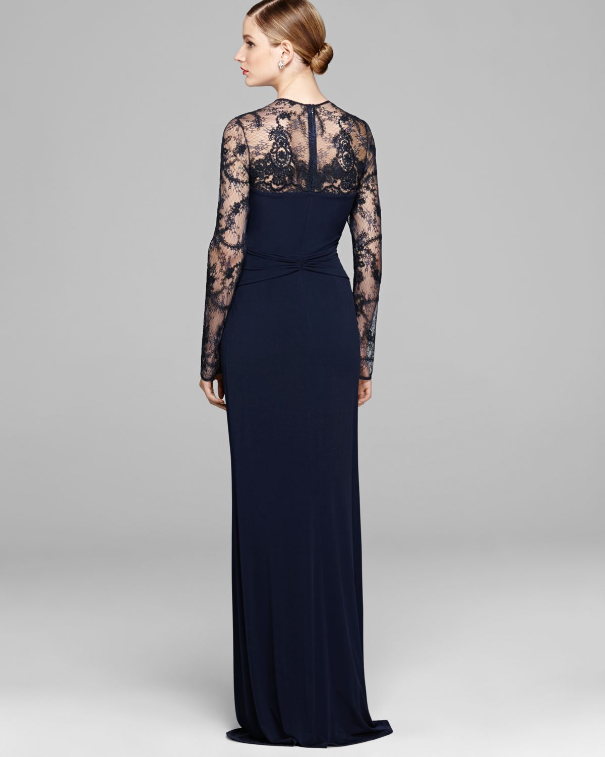 Lyst - David Meister Gown Long Sleeve Illusion Jersey with Drape Knot ...
