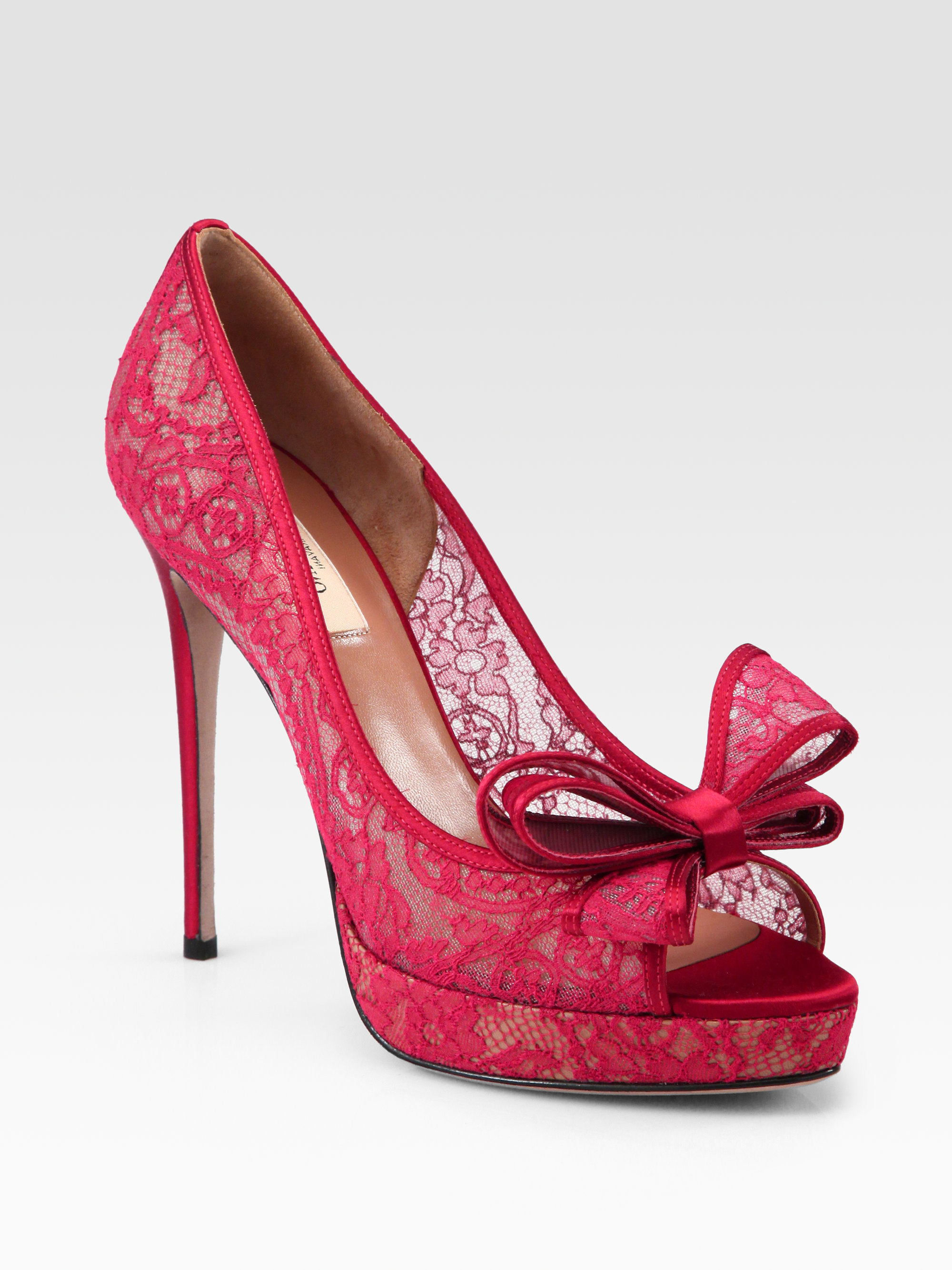 red pumps with bow on the back