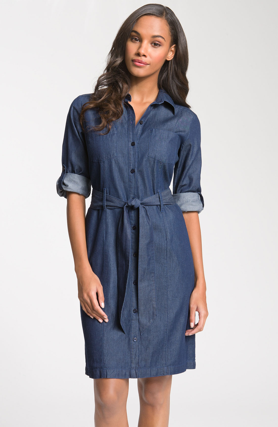 Top Selected Products and Reviews The little denim dress you never knew you always needed. This light-wash design makes haute easy—just add jewels or a belt and you're (so very) good to go. Button closure. Front pockets. 3/4-sleeves. Regular length: 40