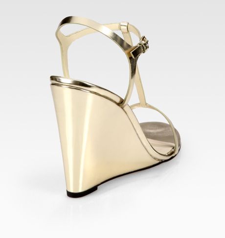 Kors By Michael Kors Ruby Metallic Leather Tstrap Wedge Sandals in Gold ...