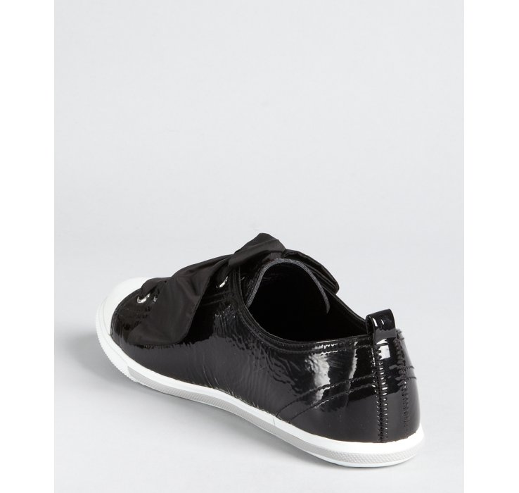 black trainers with bow