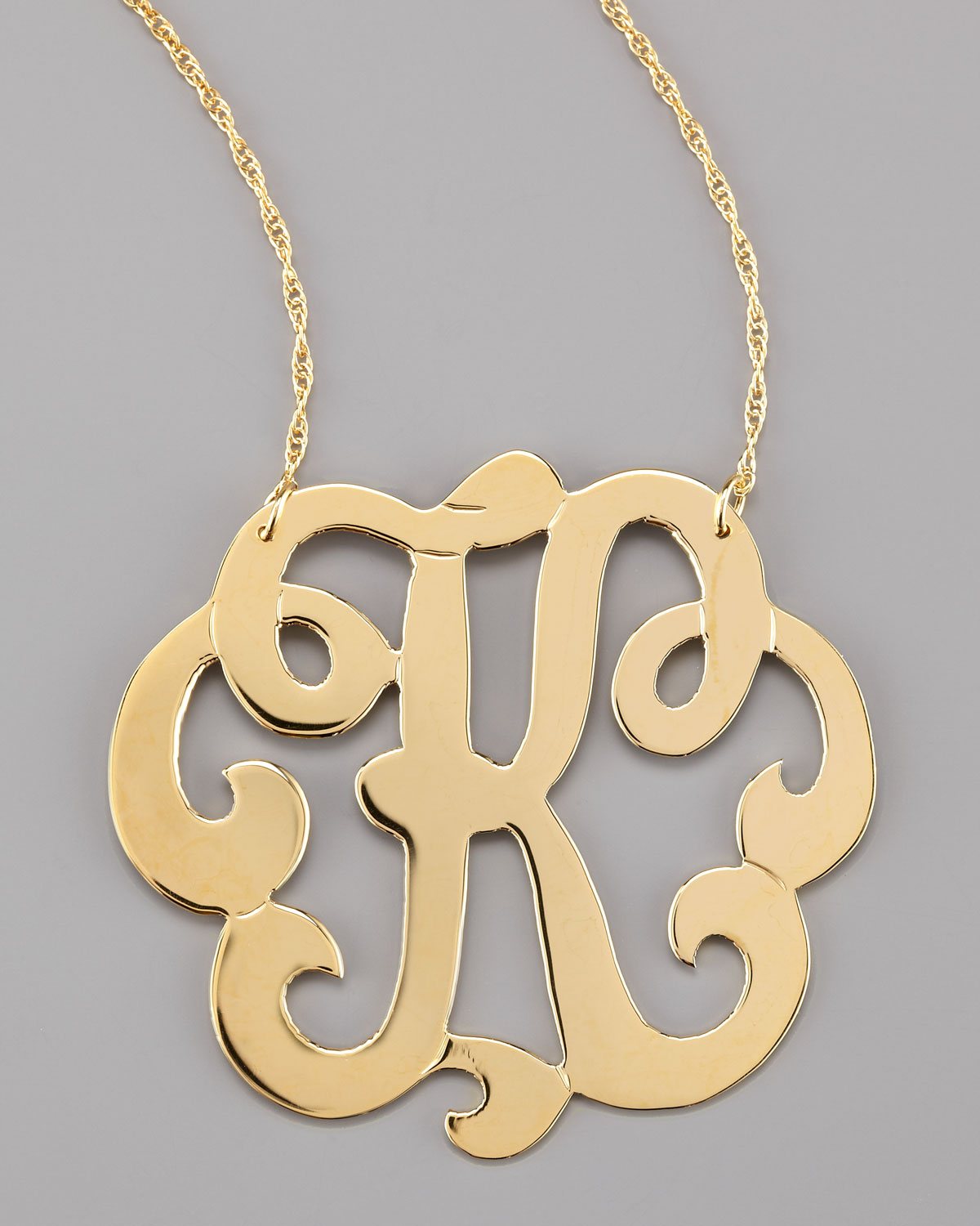 Lyst - Jennifer Zeuner Swirly Initial Necklace in Metallic