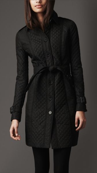 https://cdnc.lystit.com/photos/2012/05/29/burberry-black-long-quilted-trench-coat-product-4-3763831-872547248_large_flex.jpeg
