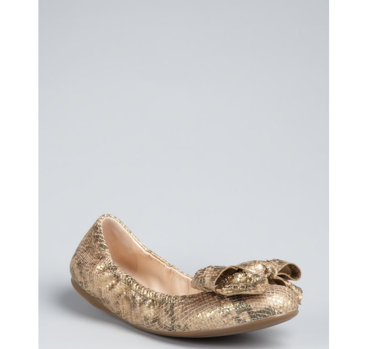 gold prada flats