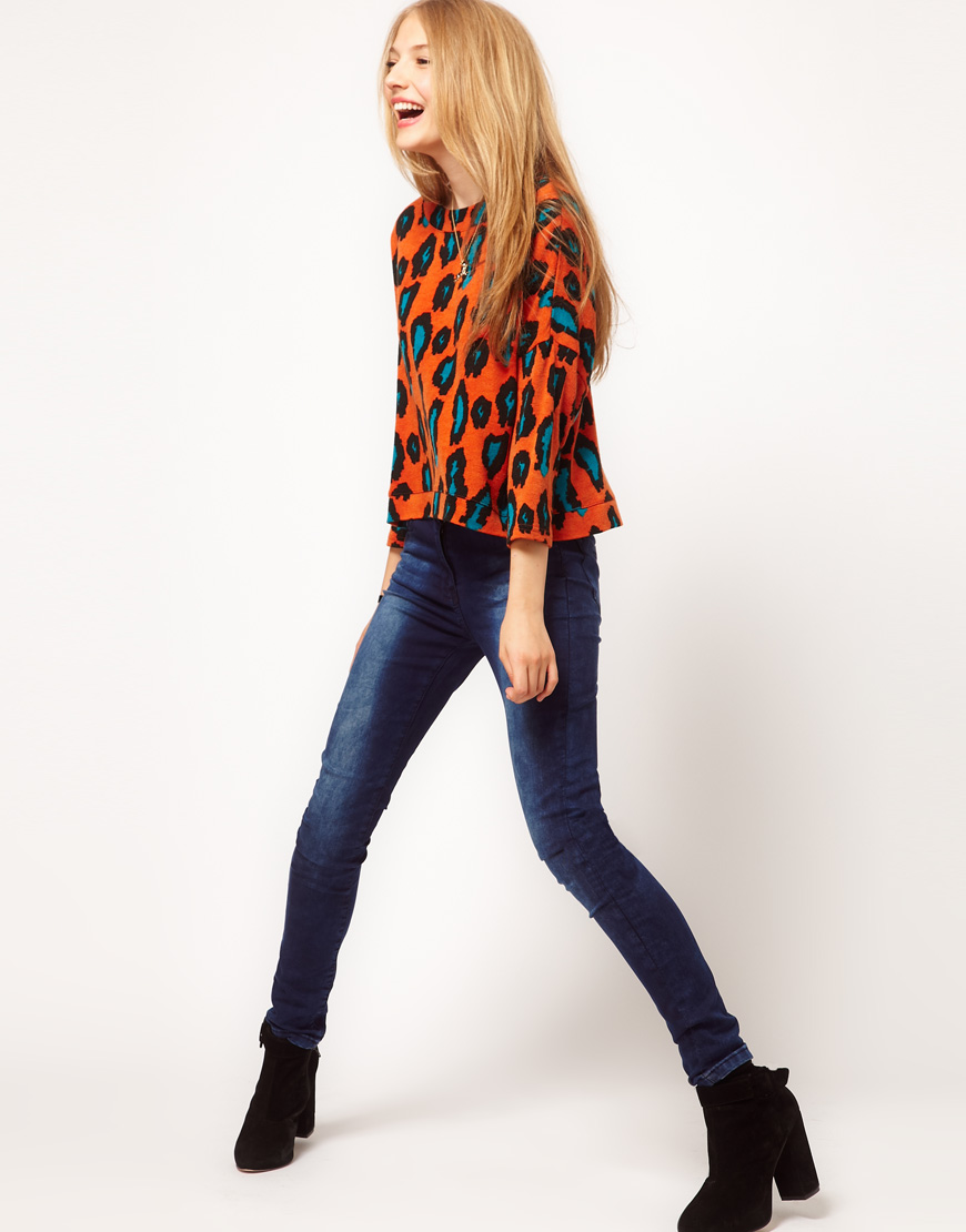 orange leopard jumper