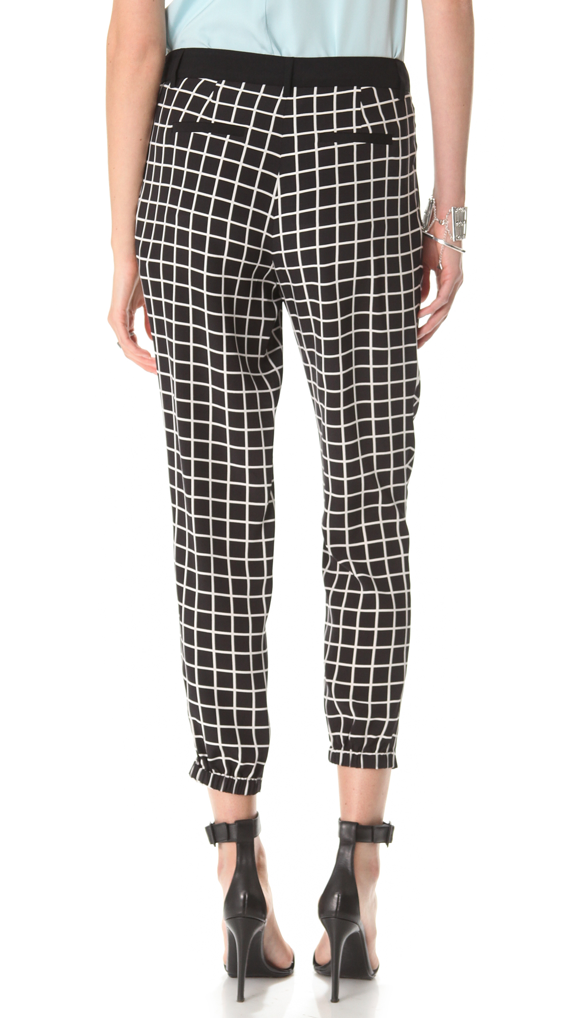 Lyst - Tibi Windowpane Pleated Pants in Black