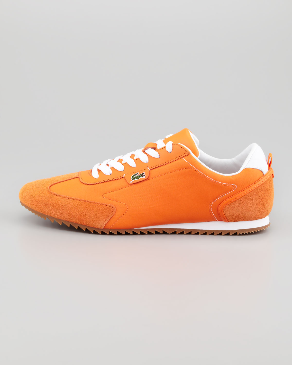 orange lacoste joggers