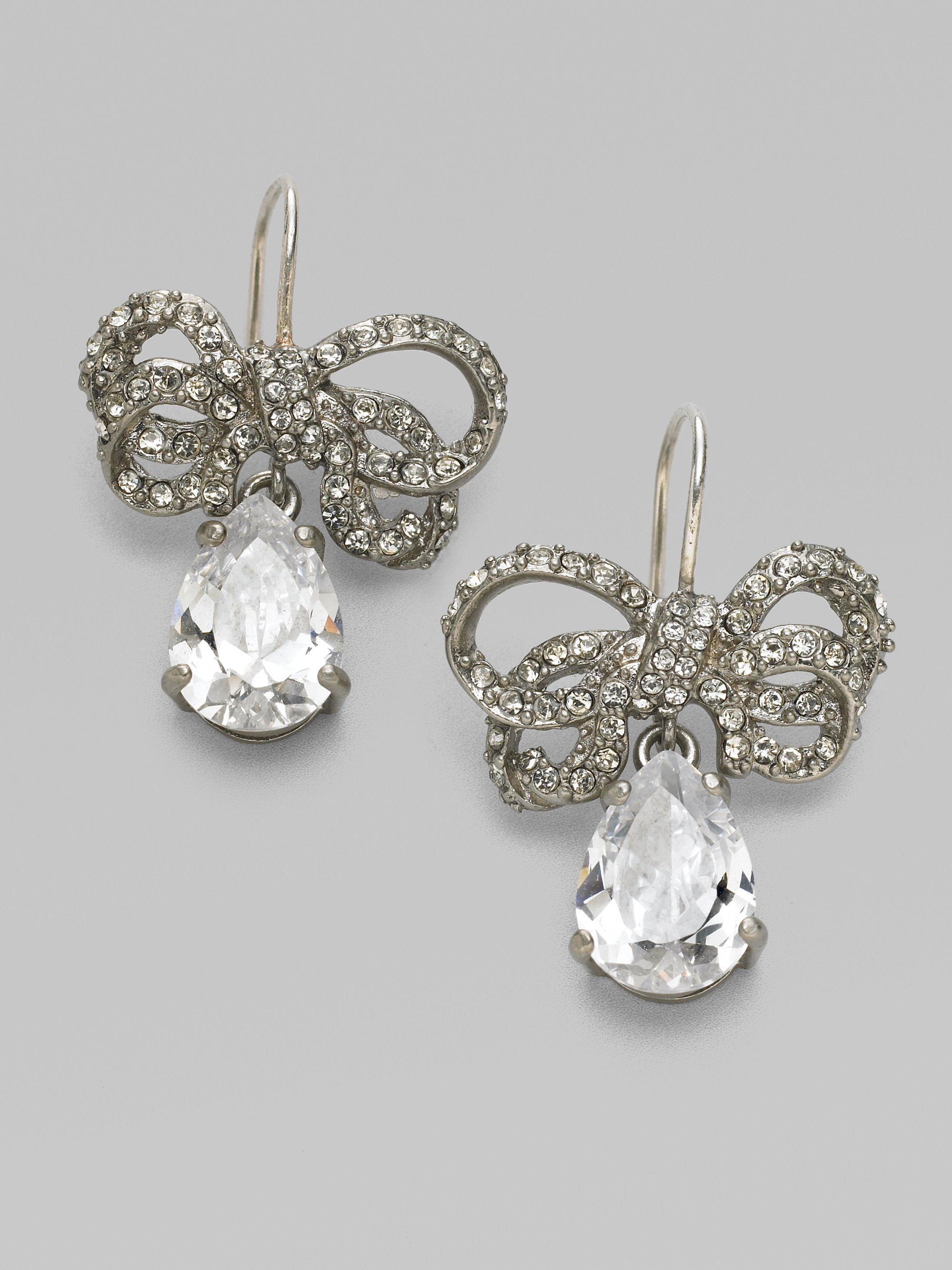 Lyst Juicy Couture Pav233 Bow Drop Earrings In Metallic Gallery