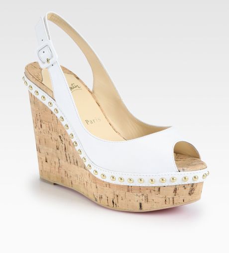 Christian Louboutin Monico Studded Leather Cork Wedge Pumps in White | Lyst