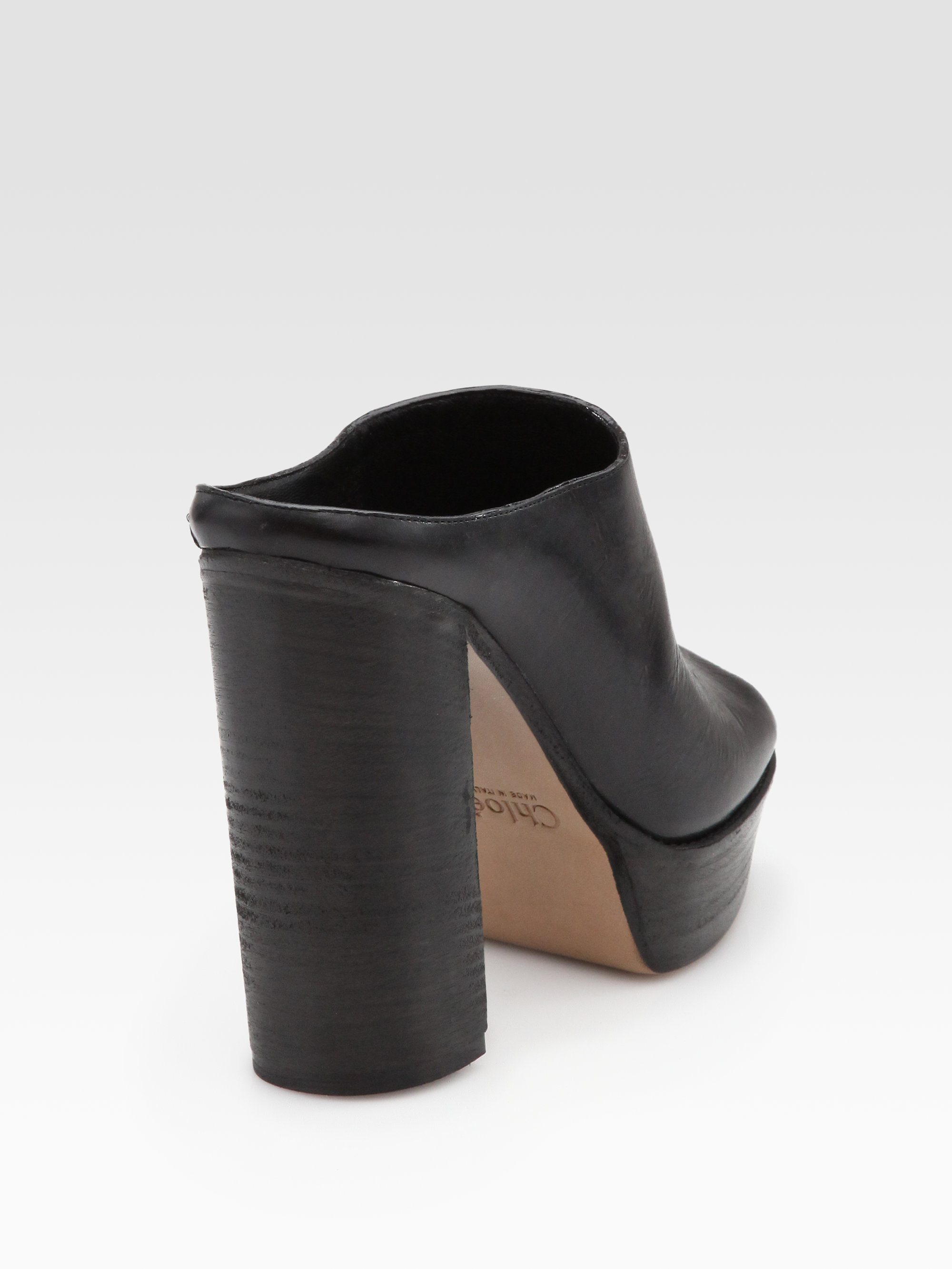 black platform mules