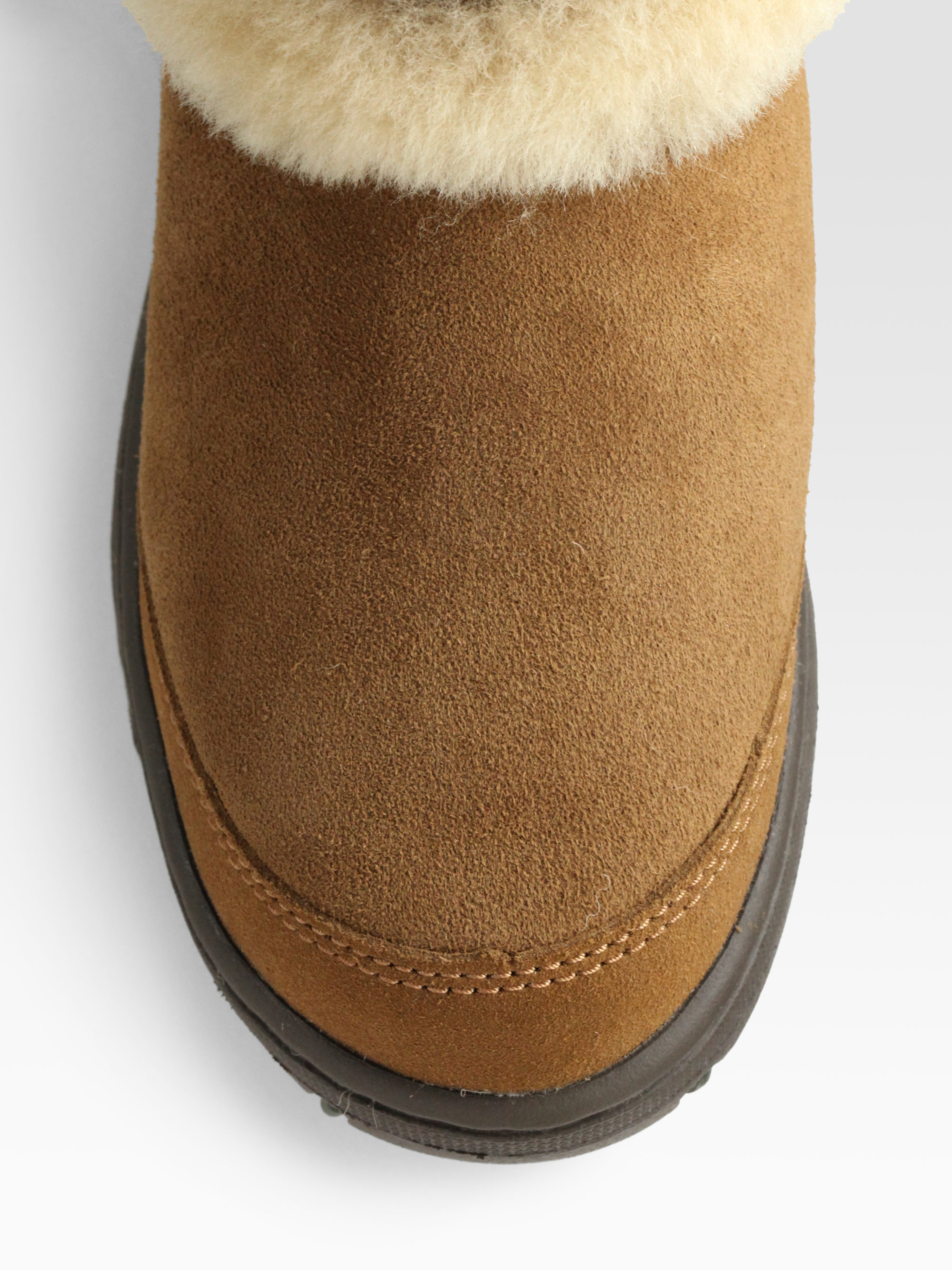 black uggs with brown trim