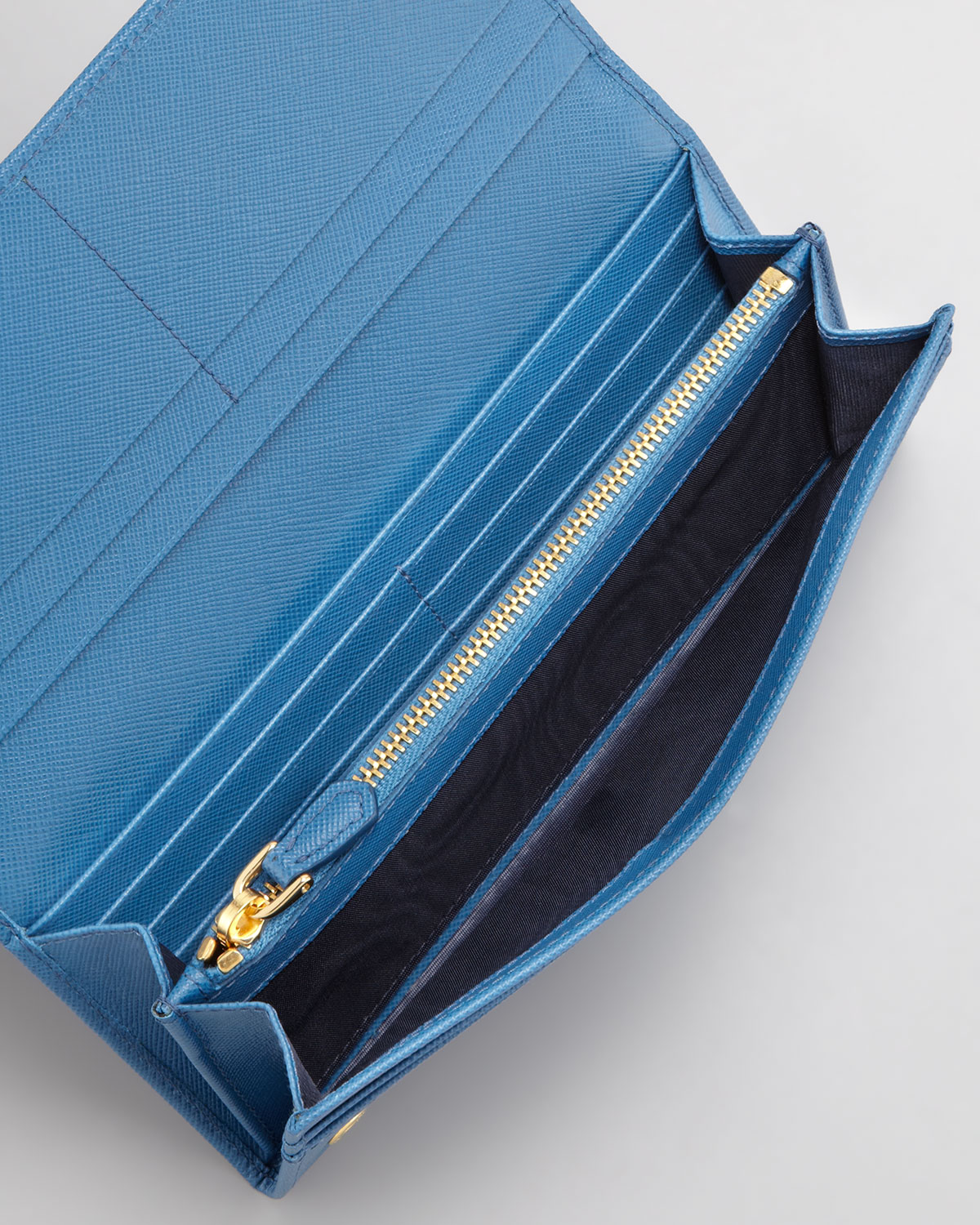 Prada Saffiano Triangle Continental Flap Wallet in Blue | Lyst  