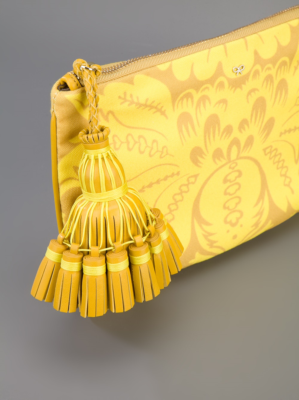 Lyst Anya Hindmarch Tassel Zipper Clutch in Yellow