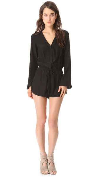 Parker Long Sleeve Romper in Black - Lyst