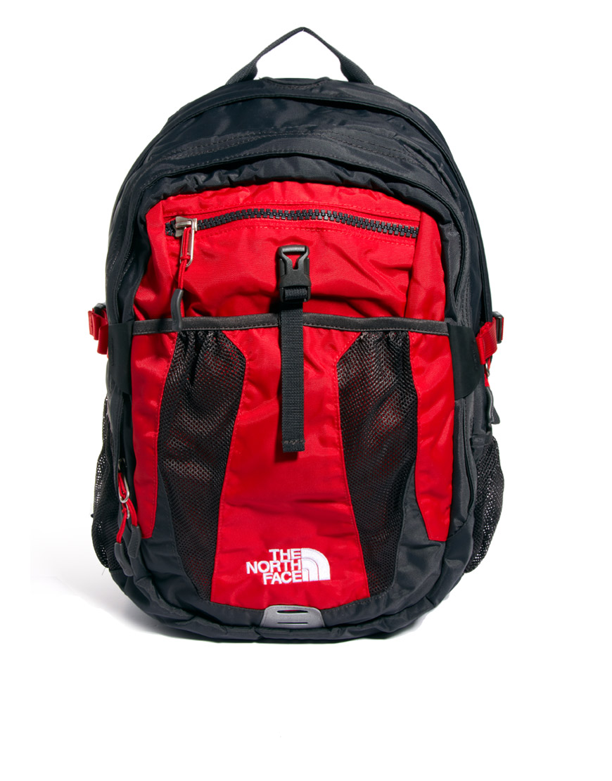 black and red north face backpack