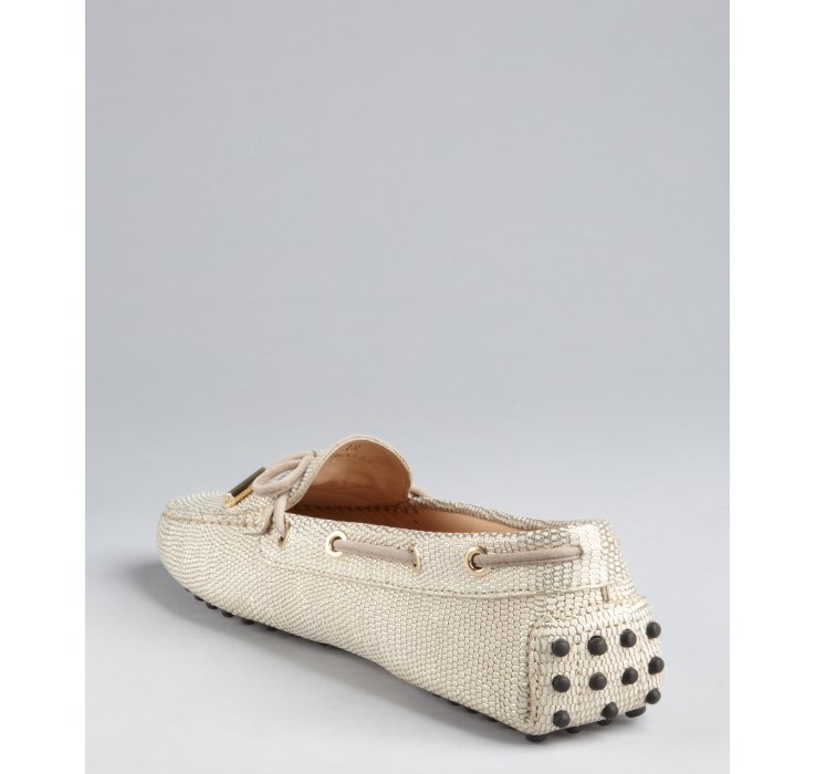 tods gold loafers
