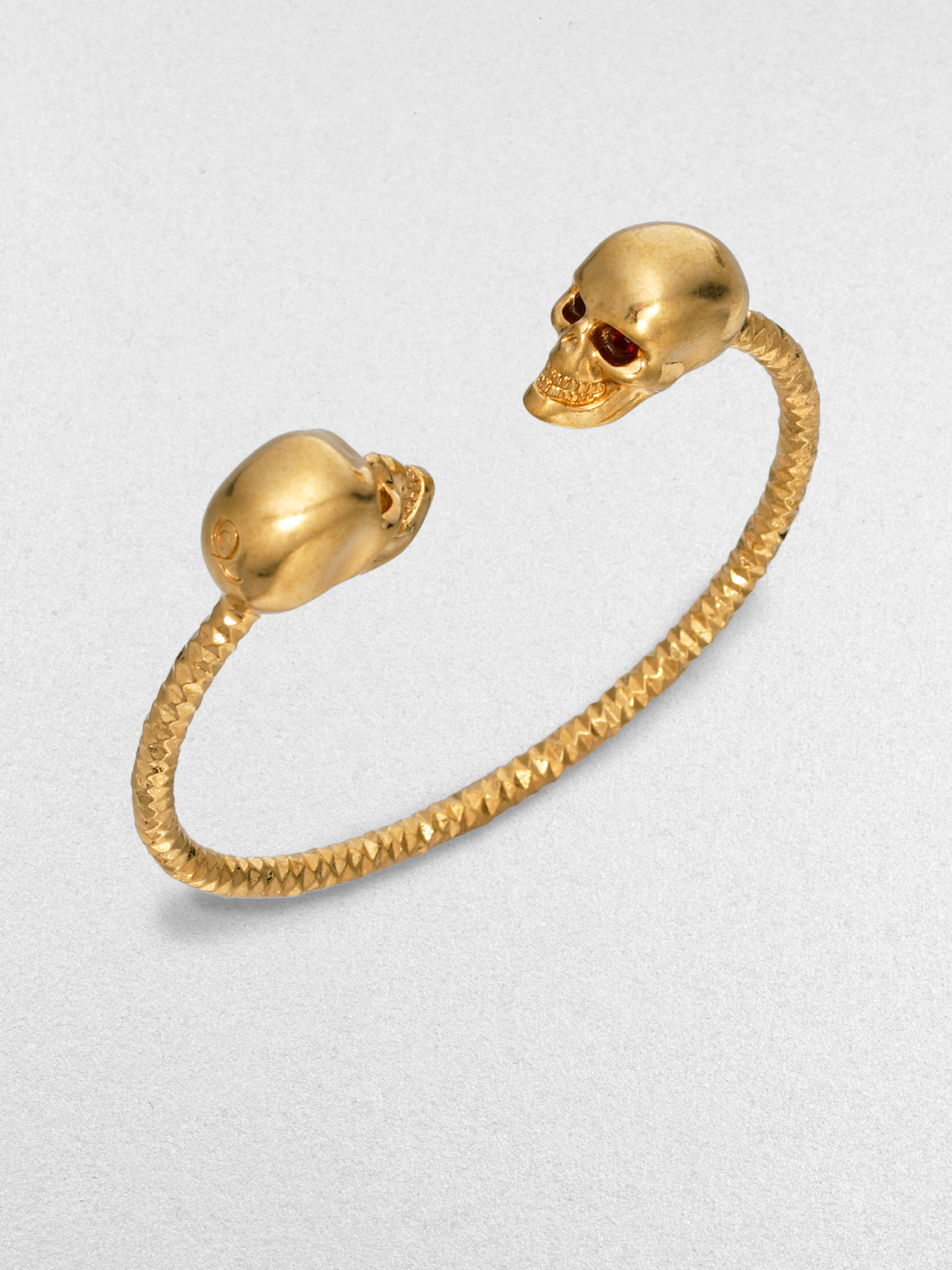 Lyst Alexander Mcqueen Twin Skull Cuff Bracelet Goldtone In Metallic Gallery