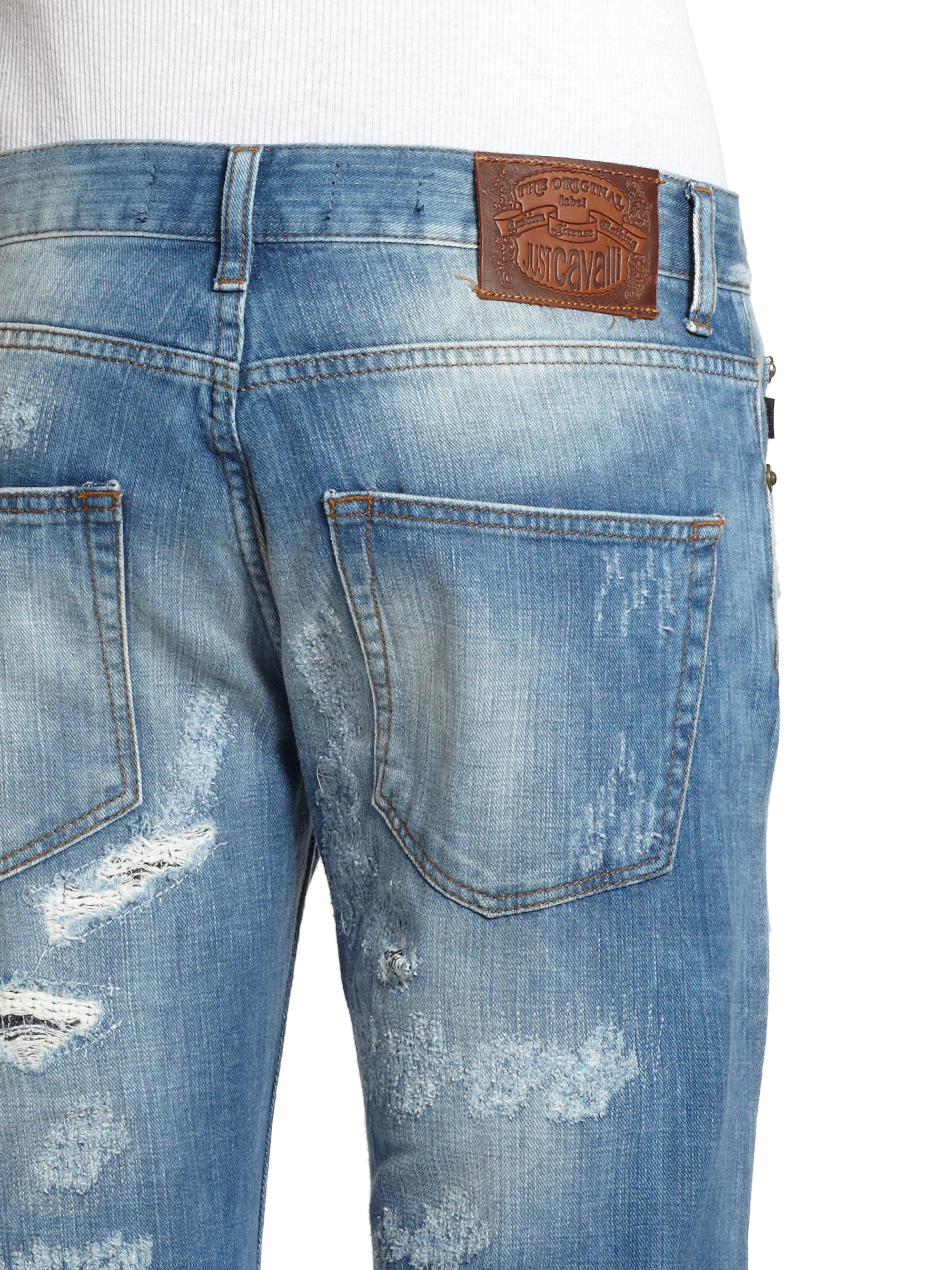 Lyst - Just Cavalli Patch Detail Distressed Straightleg Jeans in Blue ...