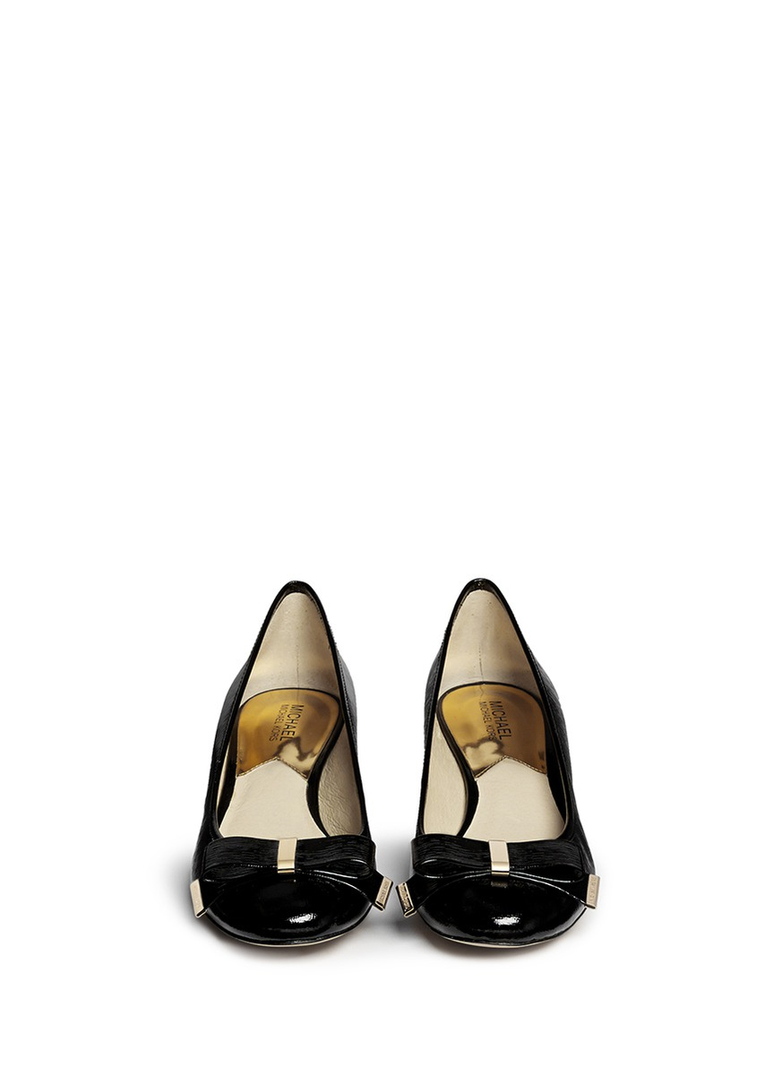 black pumps with bow in front