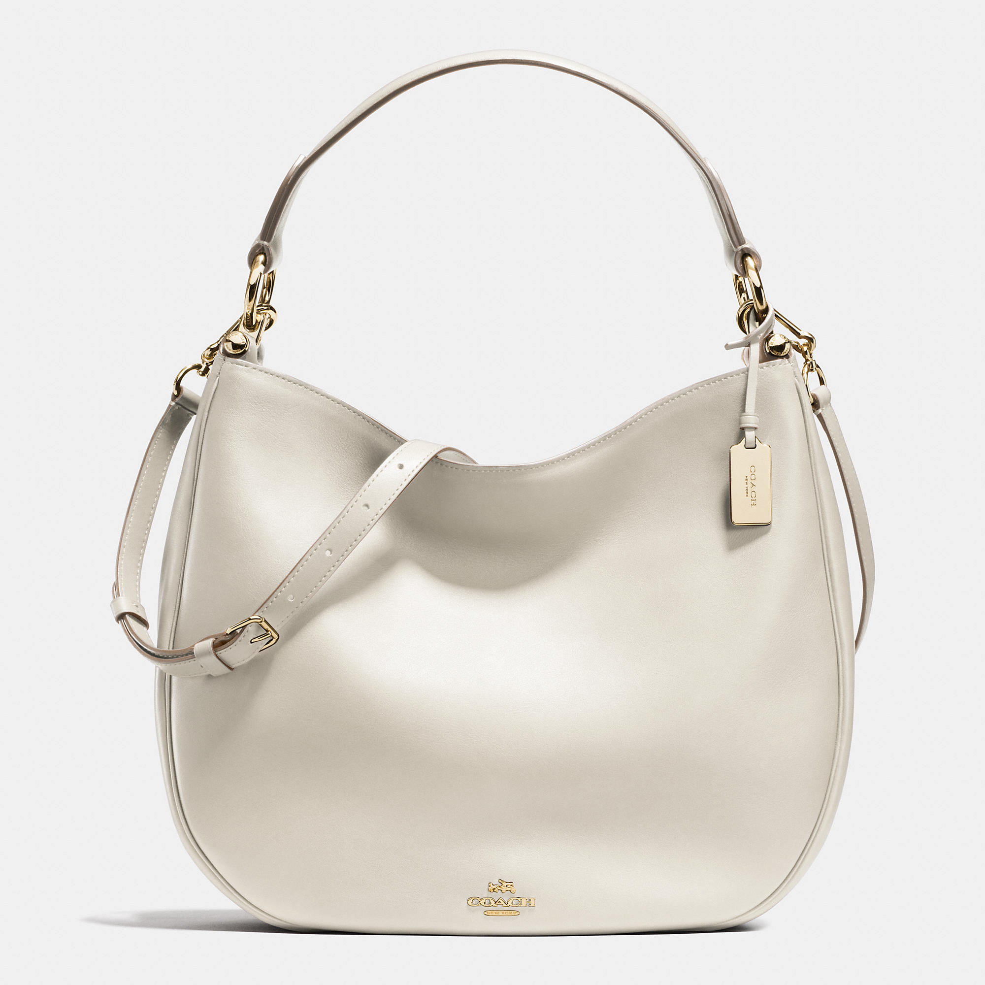 Coach Nomad Hobo In Glovetanned Leather in Gold (LIGHT GOLD/CHALK) | Lyst