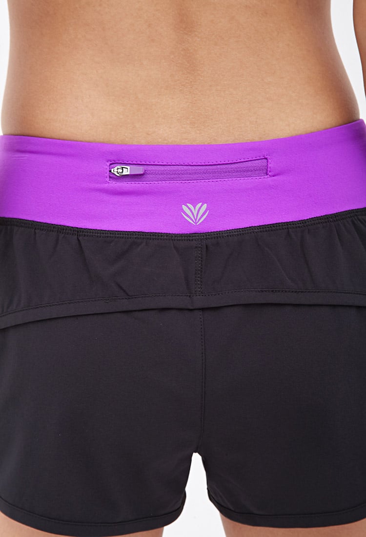 Forever 21 Dolphin Hem Running Shorts In Black Blackneon Purple Lyst 9902