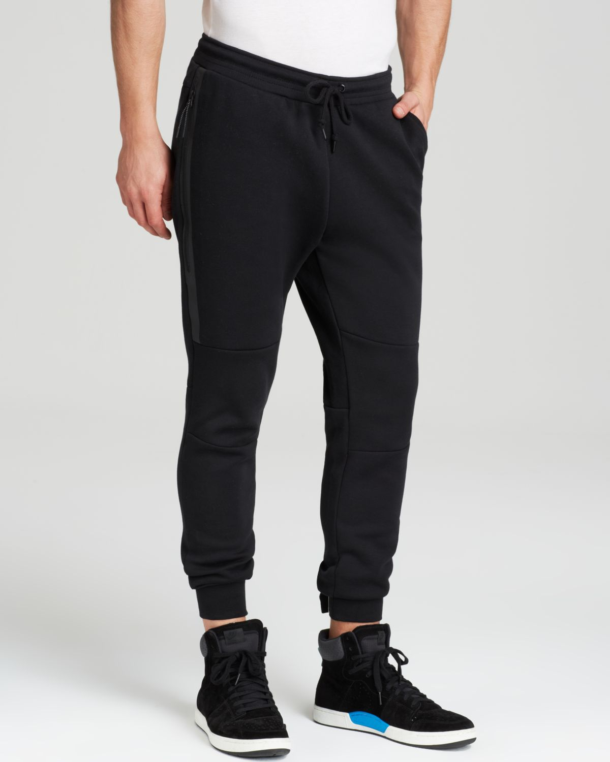 black and orange nike sweatpants