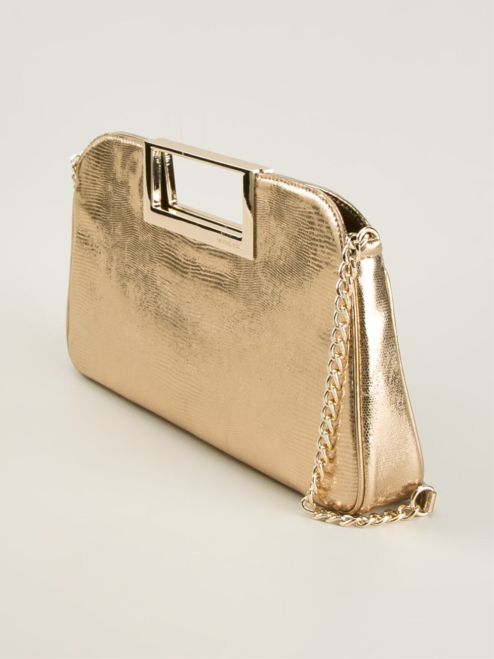 oversized gold clutch