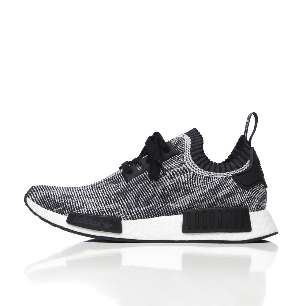 Lyst adidas Originals NMD R1 primeknit en Core Negro / gris negro Lyst adidas Originals NMD R1 primeknit en Core Negro / gris negro