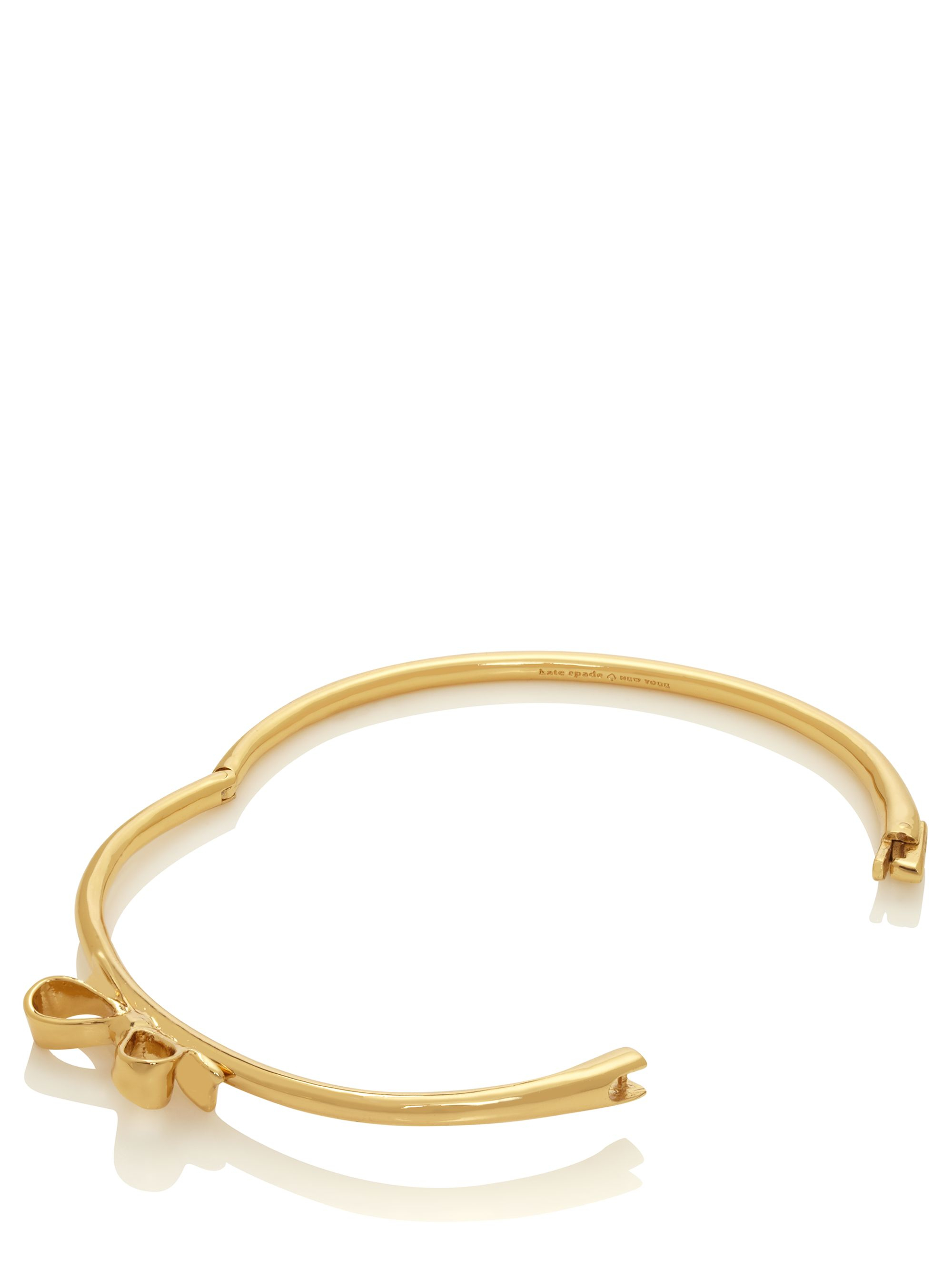 Lyst Kate Spade New York Love Notes Bow Bangle In Metallic Gallery