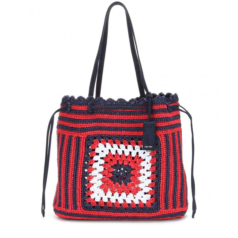 red raffia bag