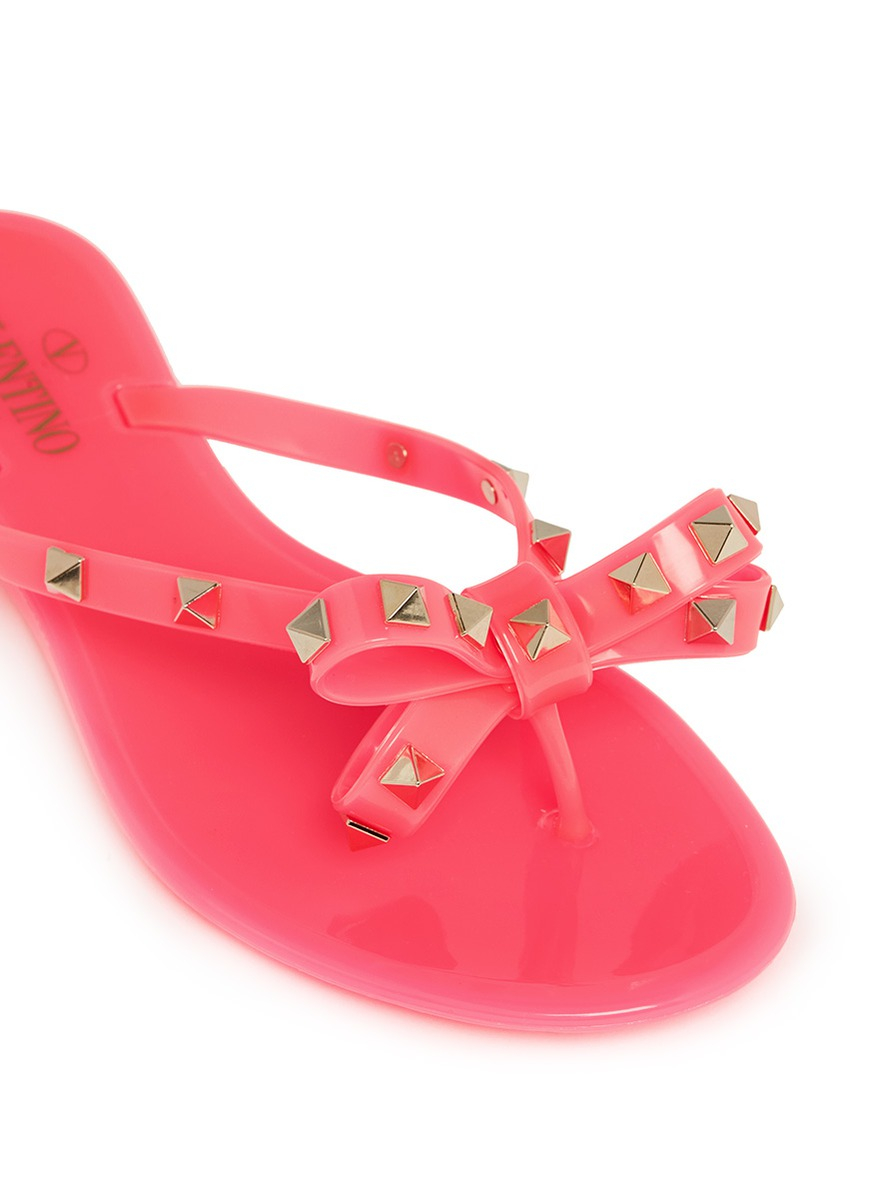 Valentino Rockstud Bow Flat Jelly Sandals in Pink - Lyst