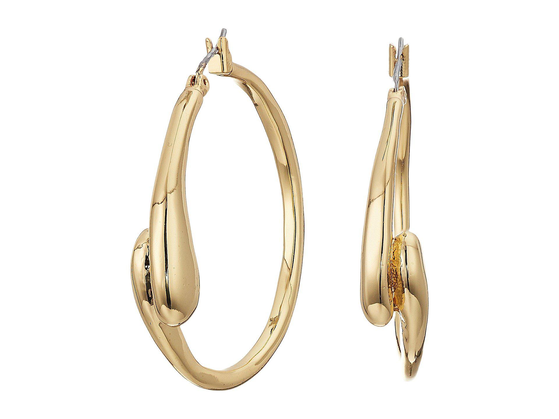 Lyst Robert Lee Morris Shiny And Brushed Gold Tone Curved Hoop Robert Lee Morris Women S Metallic Shiny And Brushed Gold Tone Curved Hoop Earrings