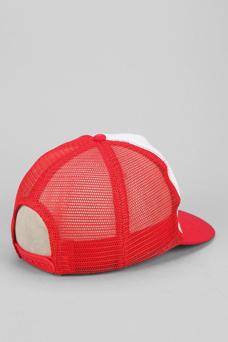 men red trucker hat