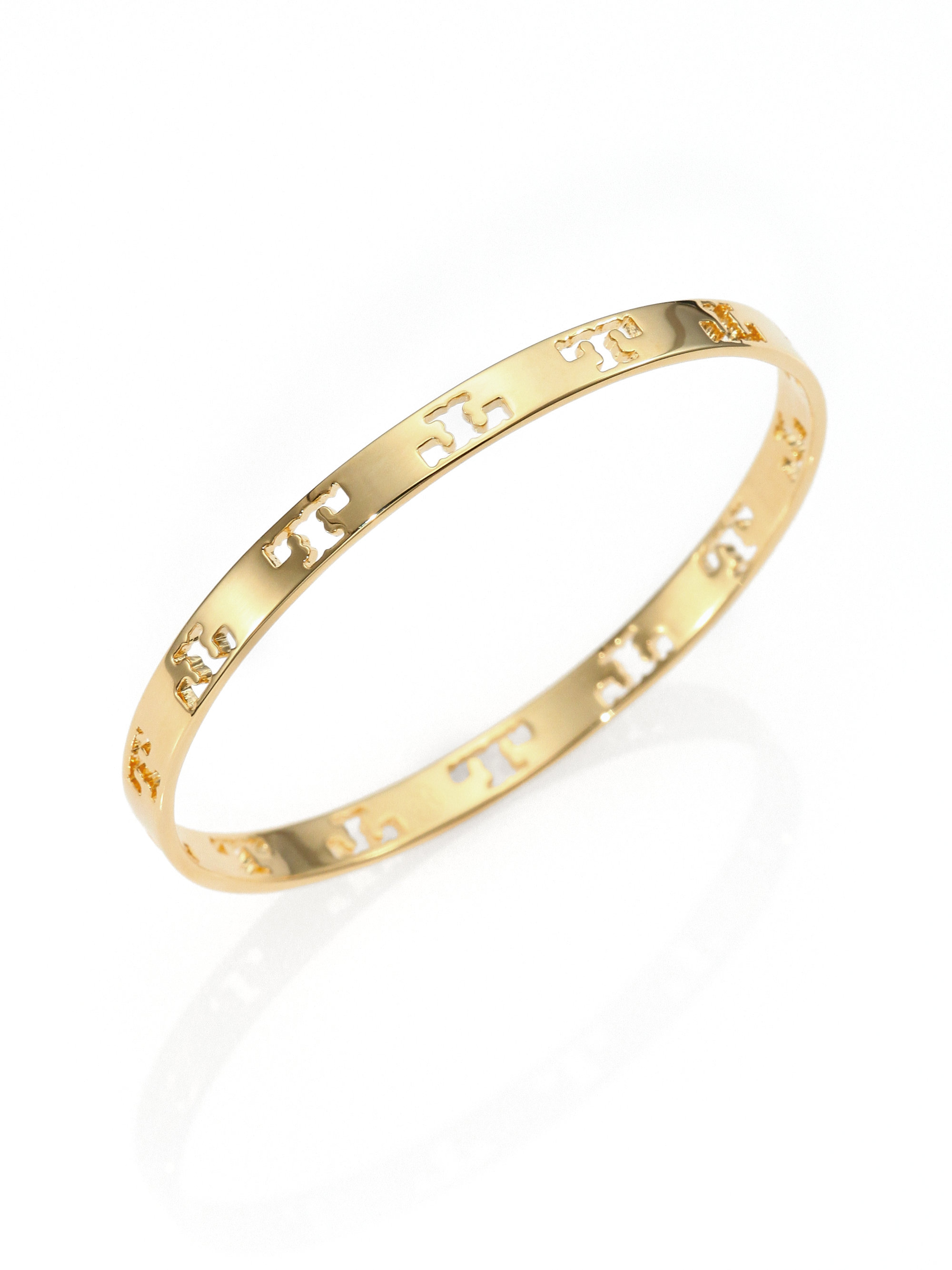 Lyst Tory Burch Pierced T Logo Bangle Bracelet In Metallic Gallery