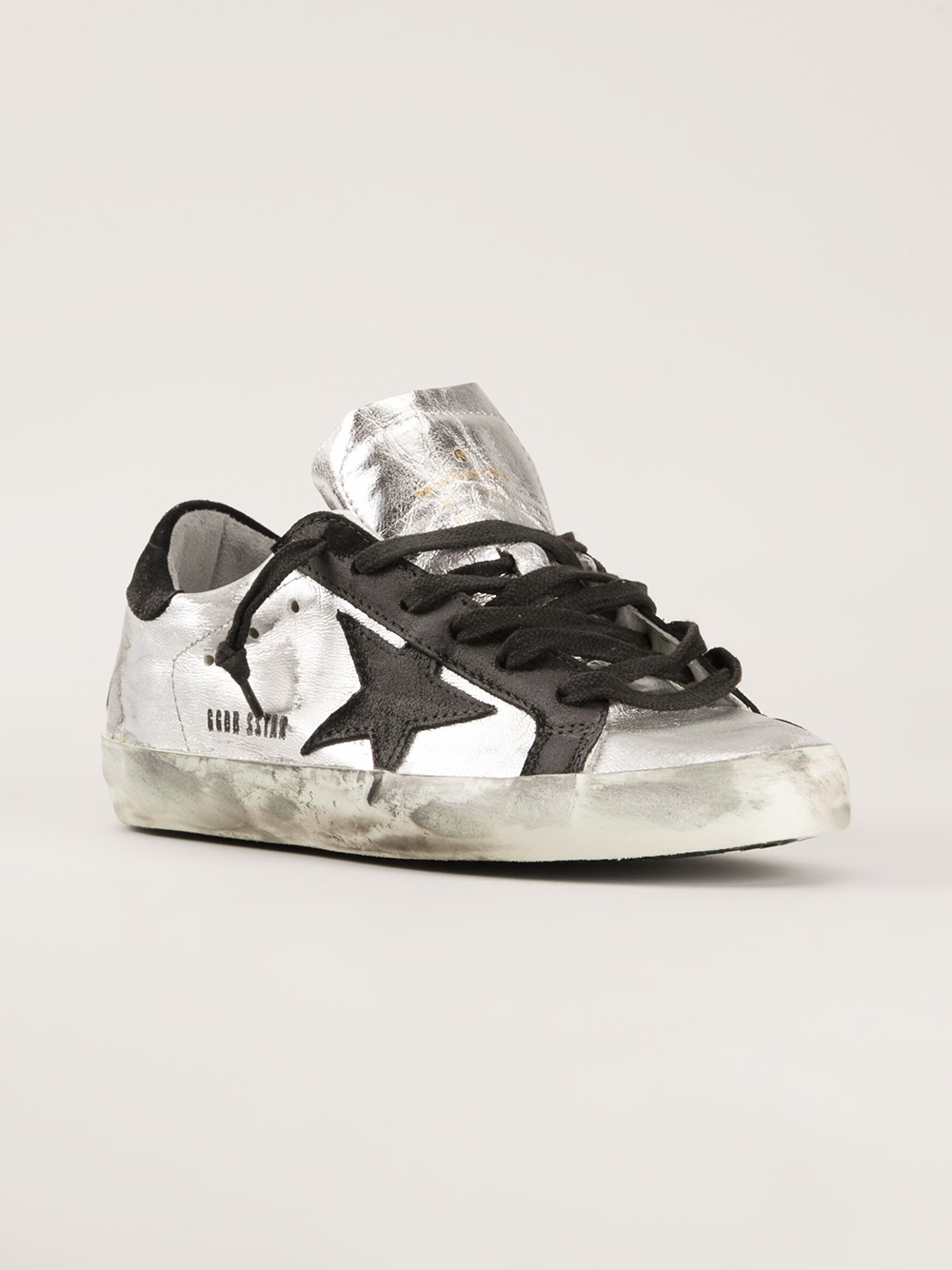 golden goose distressed sneakers