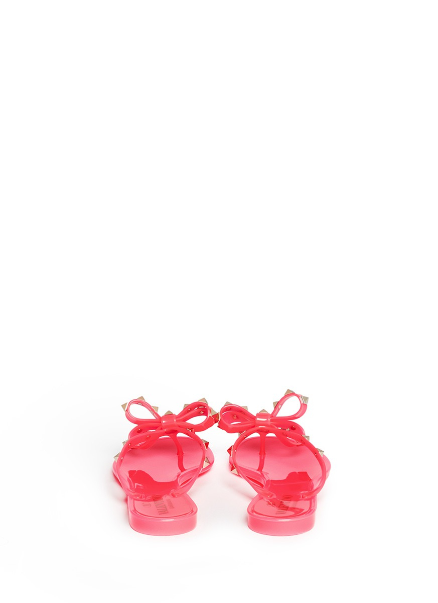 Lyst - Valentino Rockstud Bow Flat Jelly Sandals in Pink