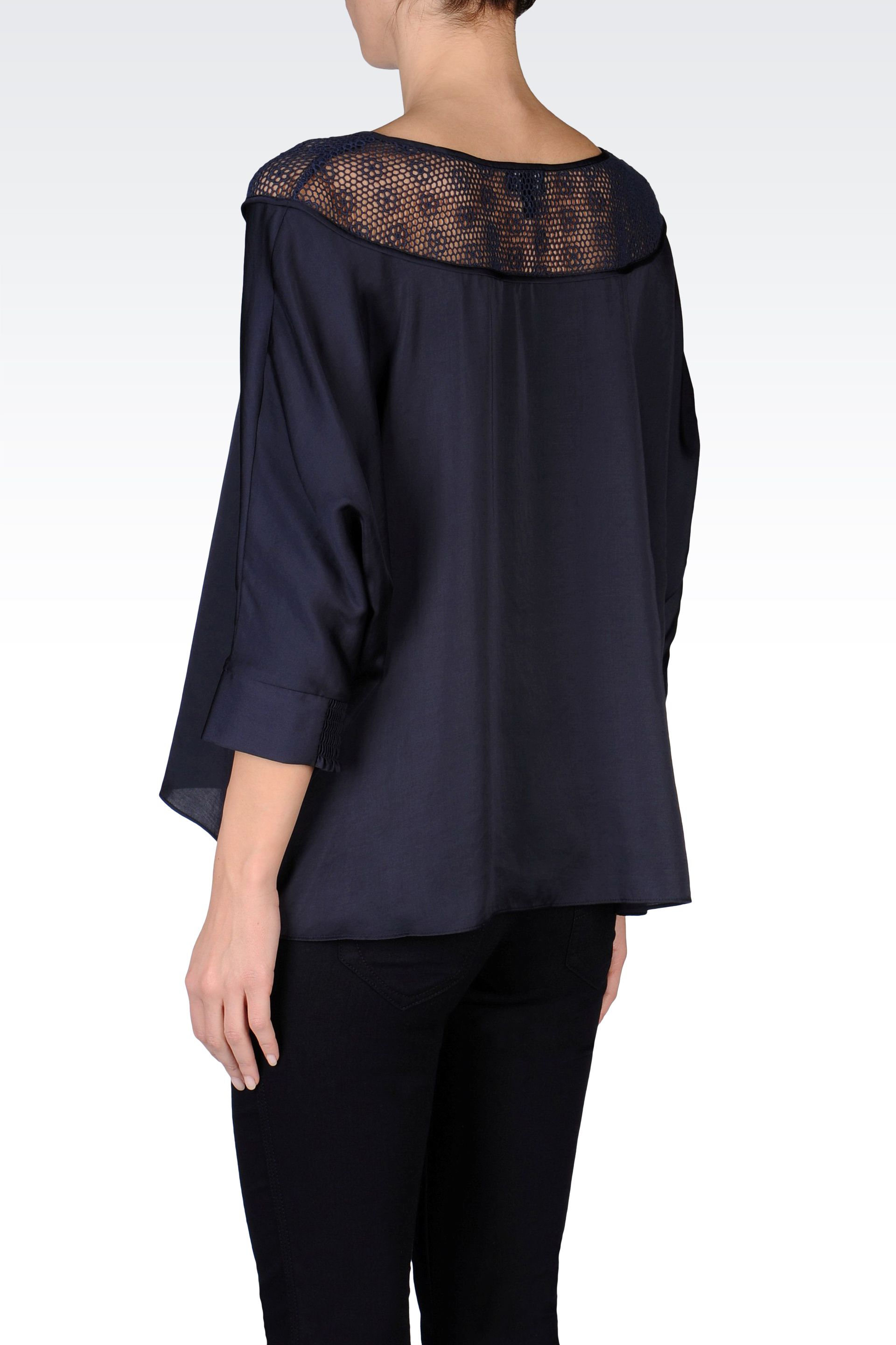 blue blouse and jeans