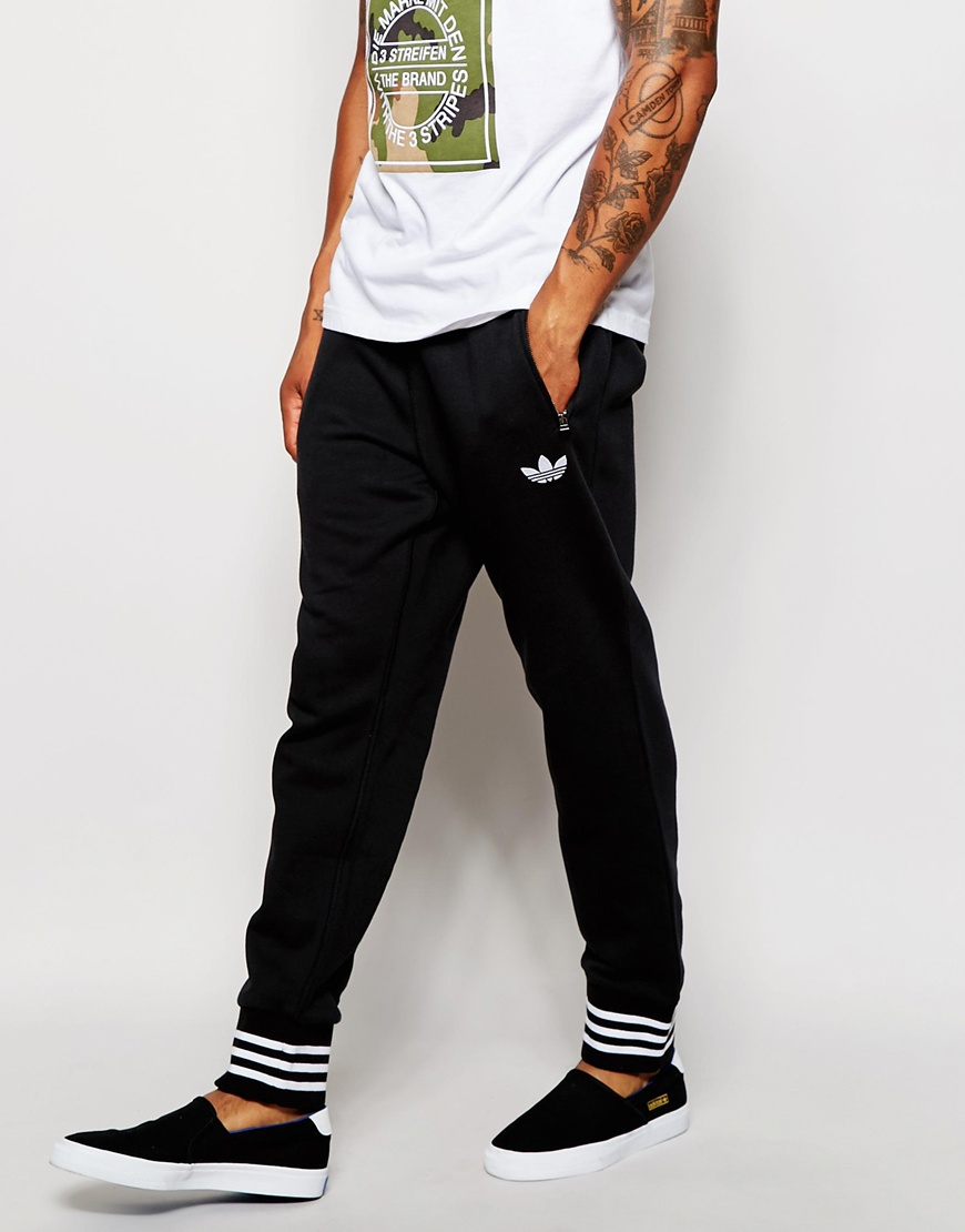 Lyst - Adidas Originals Drop Crotch Joggers With Varsity Cuff in Black ...