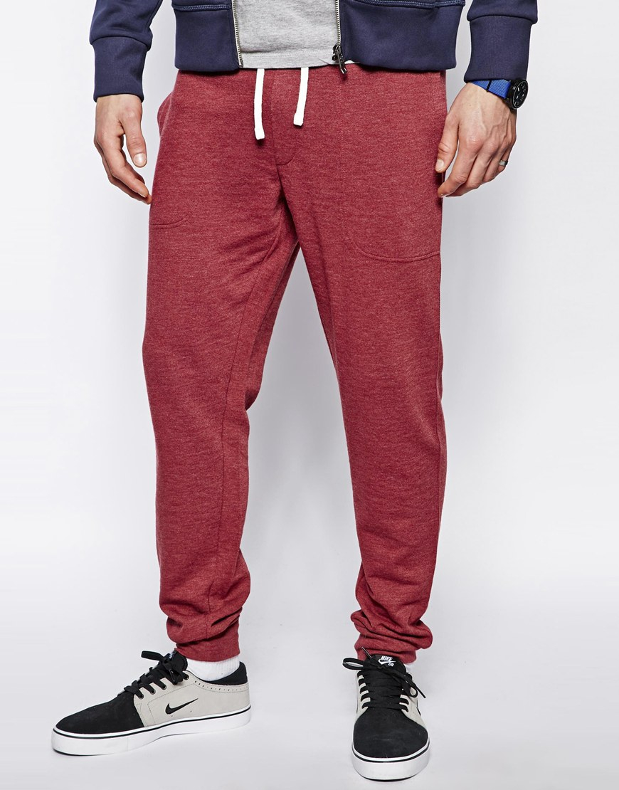 red nike tick joggers