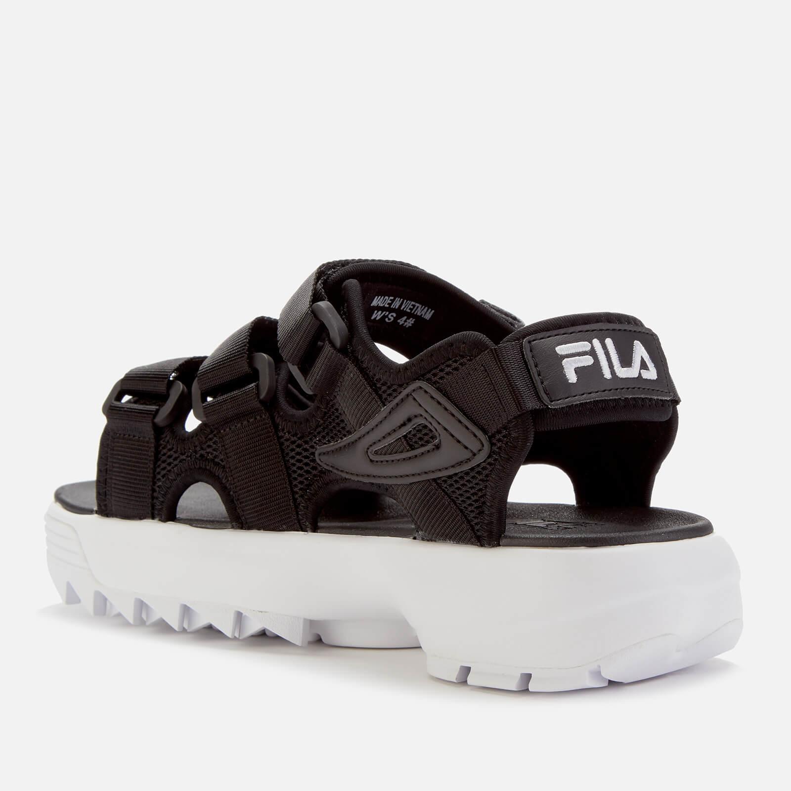  Fila  Disruptor Sandals  in Black Lyst