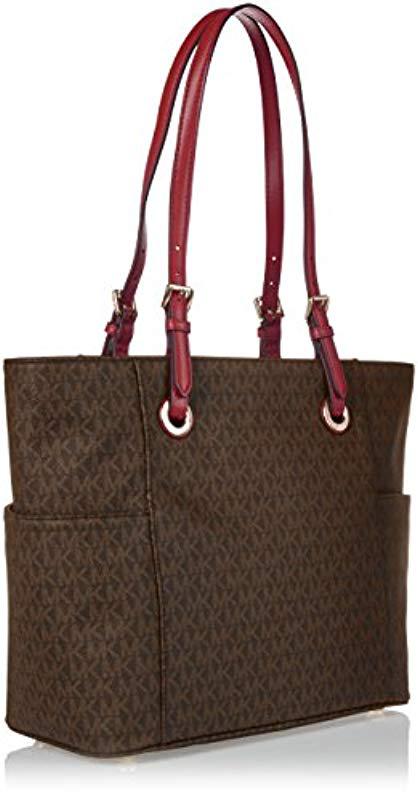 Lyst Michael Kors Jet Set Travel Small Logo Tote Bag In Brown Michael Kors Brown Jet Set Travel Small Logo Tote Bag Lyst View Fullscreen