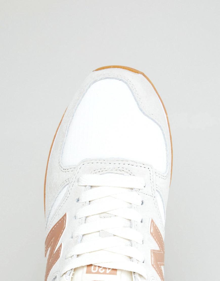 new balance 420 trainers with rose gold trim in grey new balance 420 trainers with rose gold trim in grey