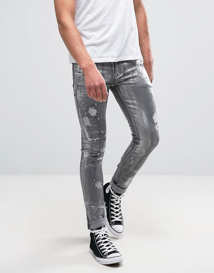 Asos Super Skinny Jeans With Rips In Metalic Sliver Coated Washed Black ...