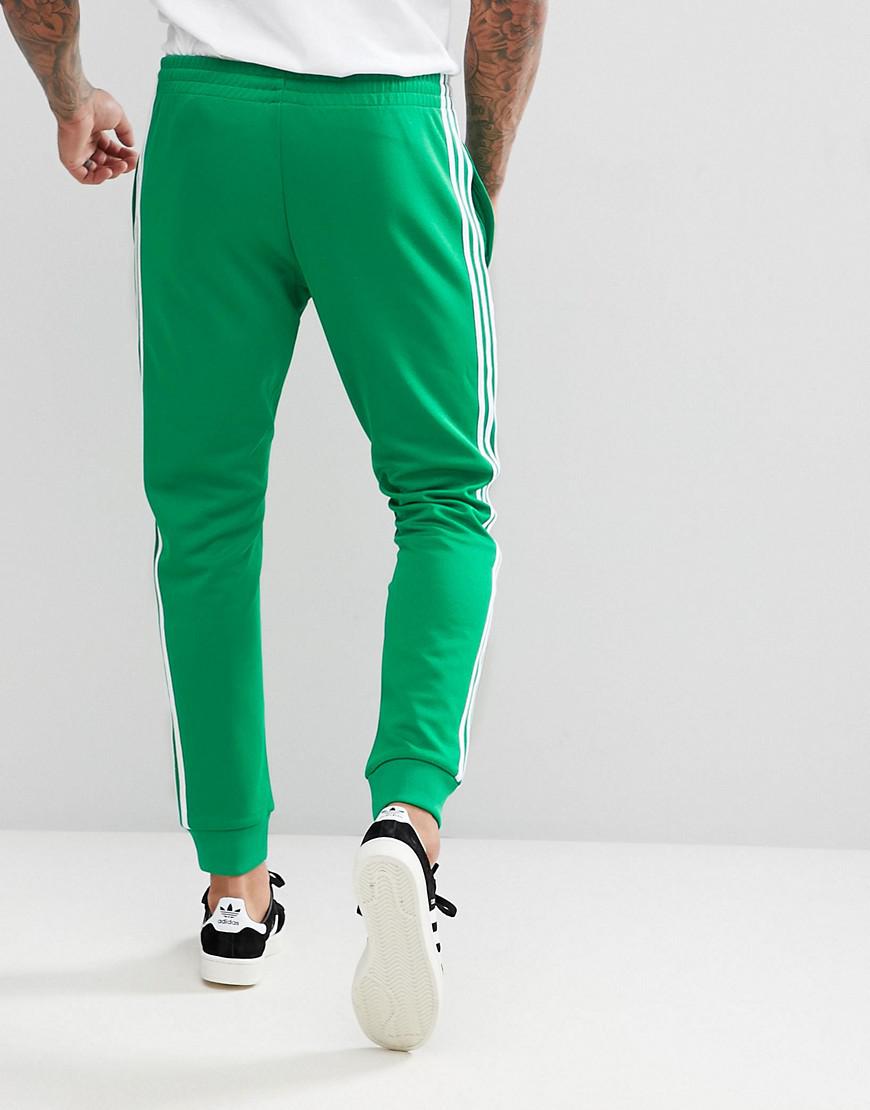 Lyst - adidas Originals Adicolor Superstar Joggers In Green Cw1278 in ...