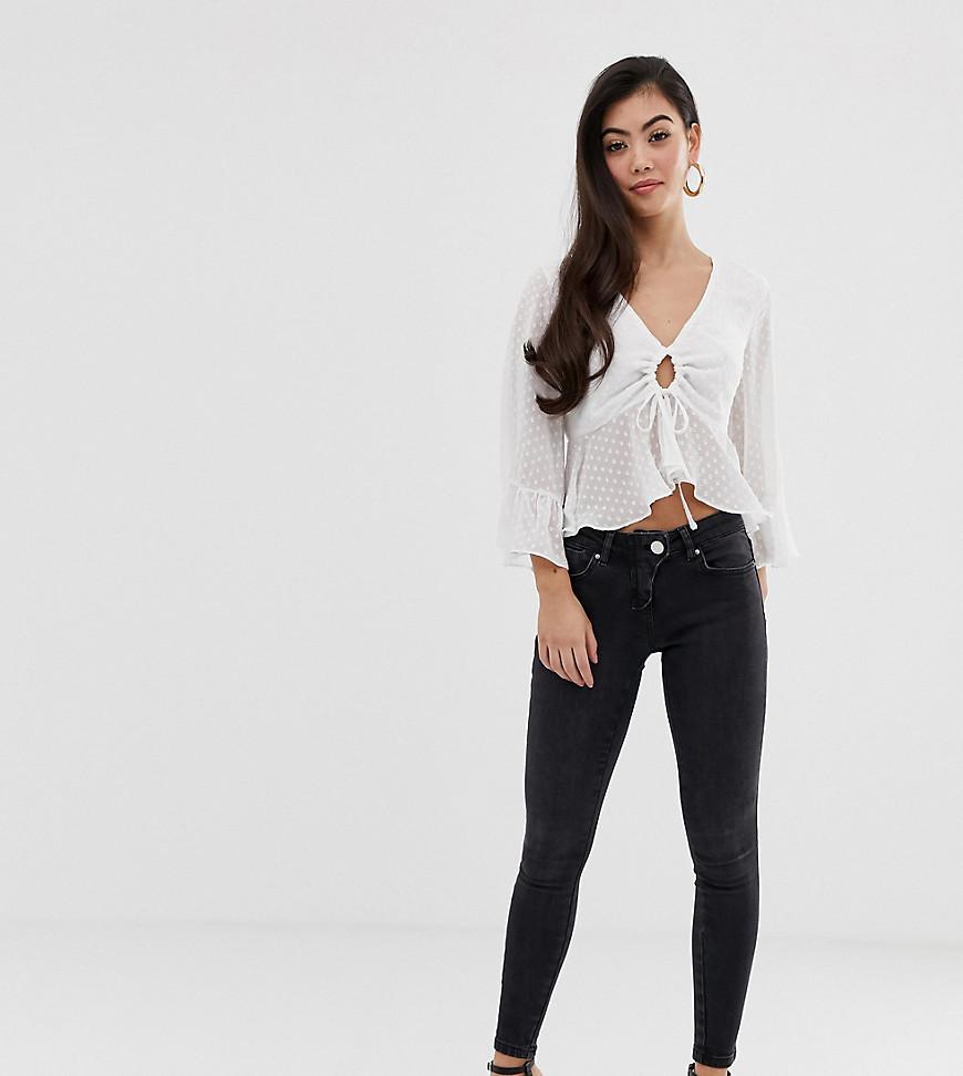 low rise black skinny jeans