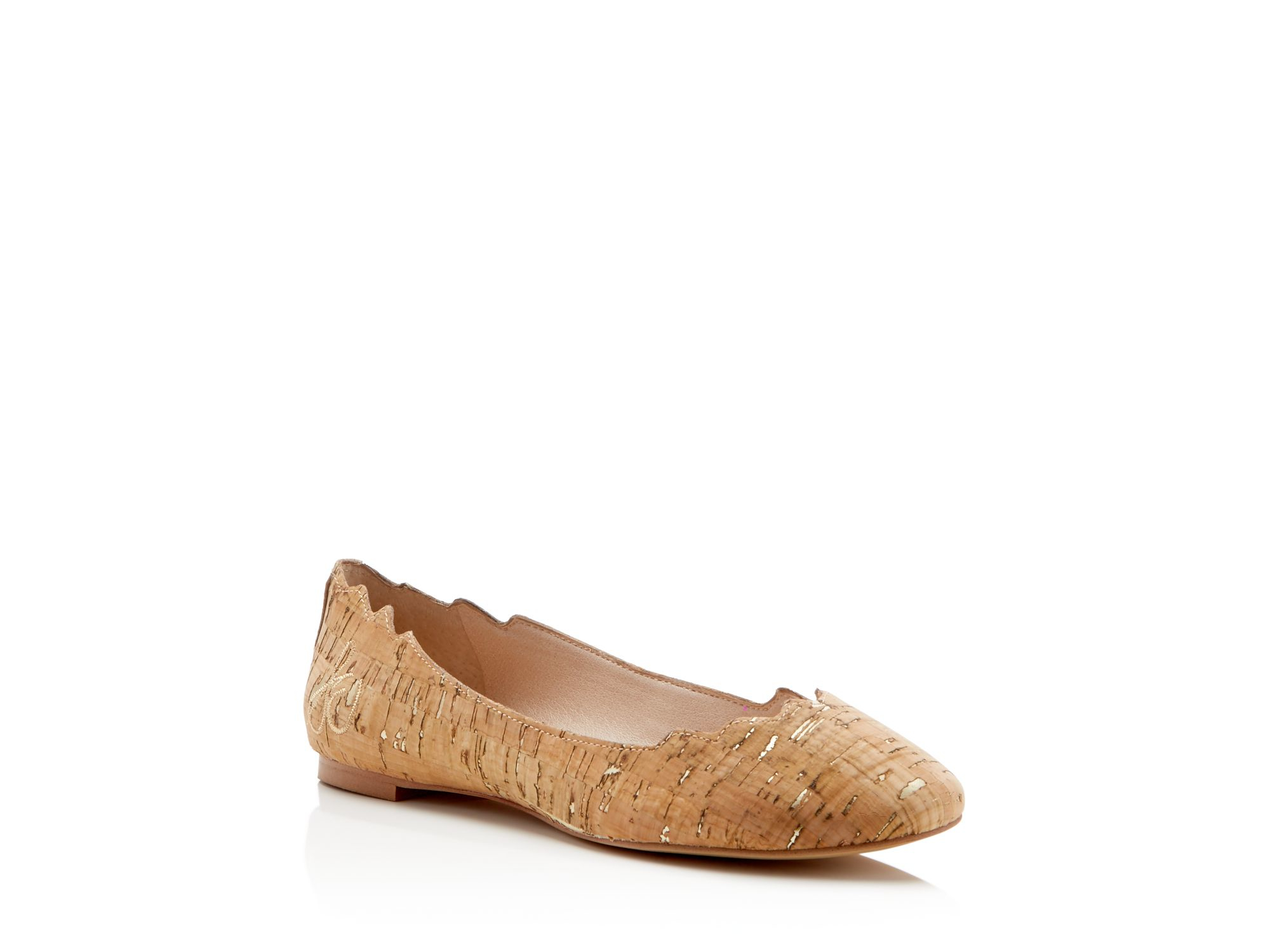 ballet flats with scalloped edges
