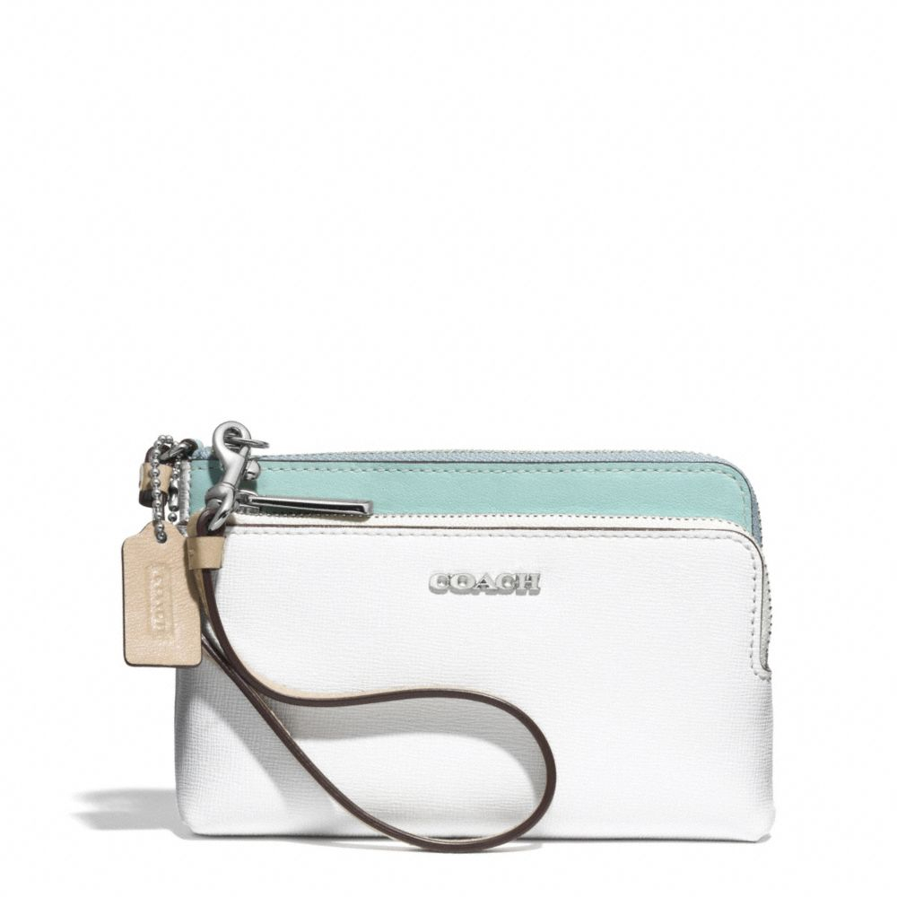 coach wristlets white