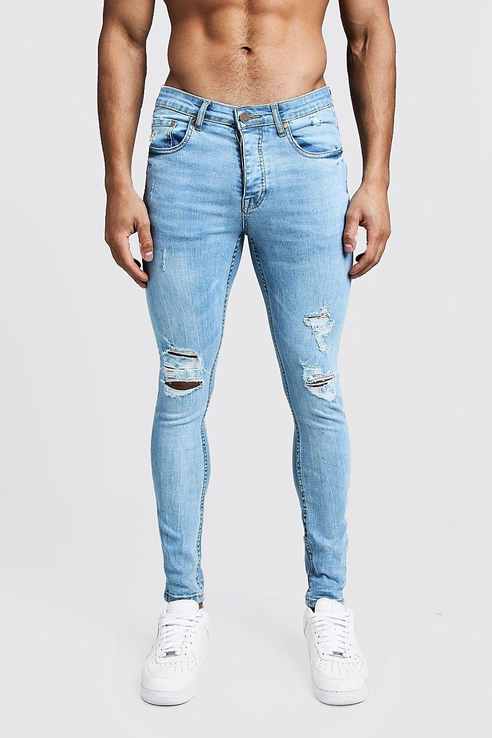 BoohooMAN Spray On Skinny Jeans With Distressed Knees in Blue for Men ...