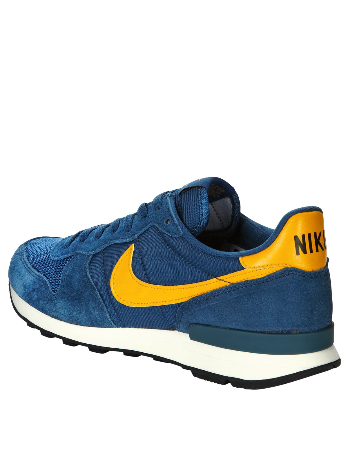 blue and yellow nike trainers